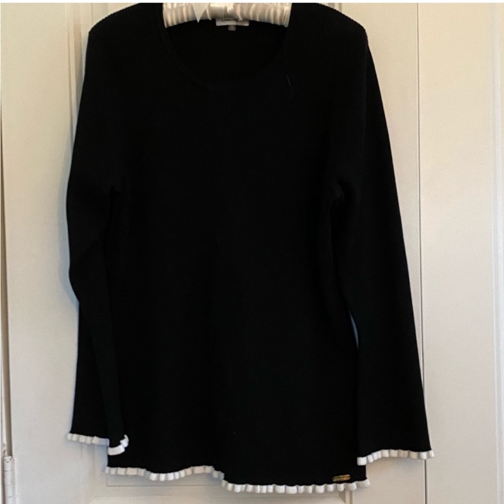 Calvin Klein black sweater with white ruffle trim